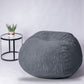 Graphite grey corduroy Shloomfy beanbag in a studio