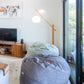 Graphite corduroy Shloomfy beanbag in an open-plan living room